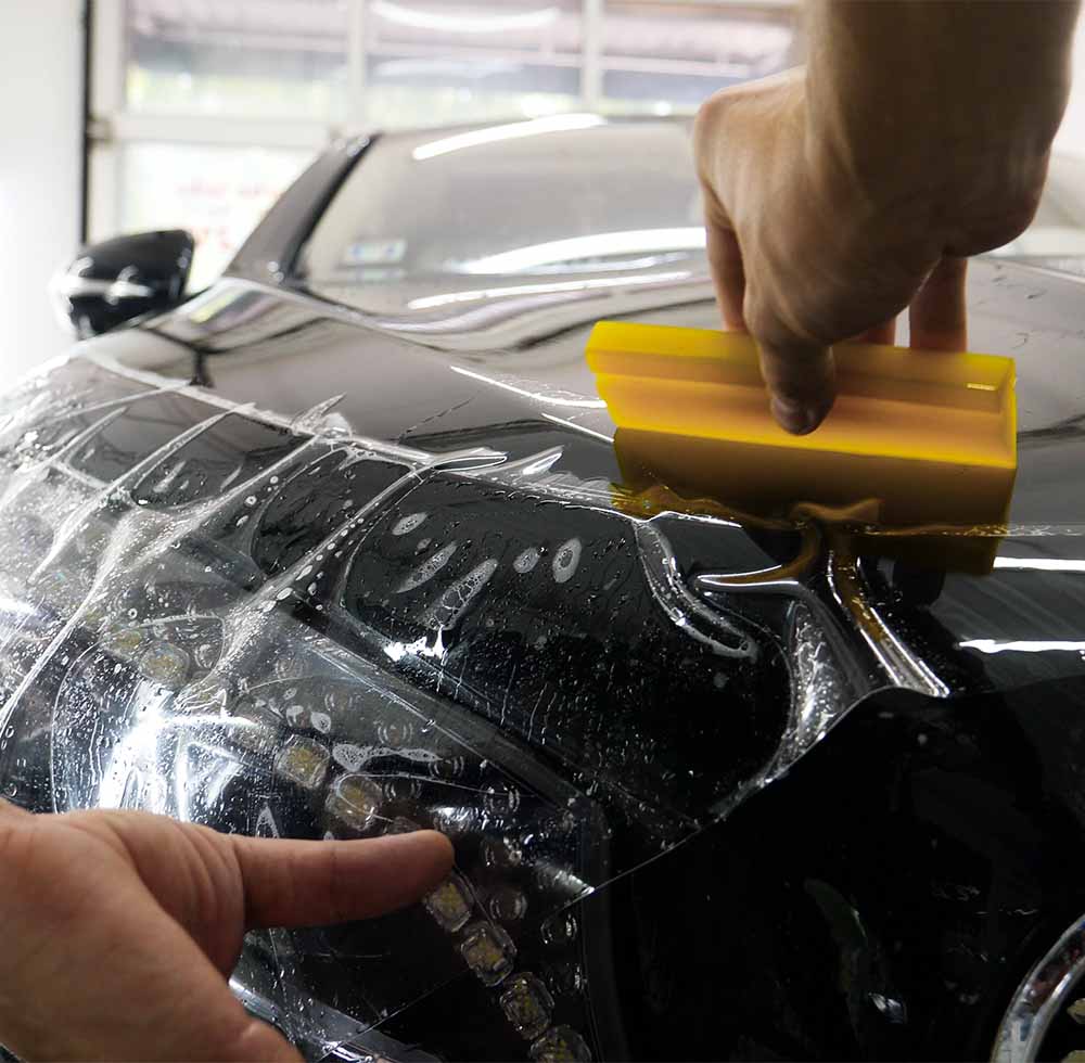 autobahn paint protection film being applied